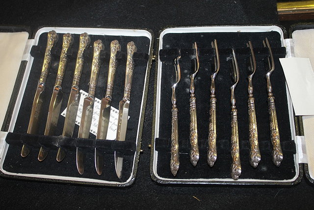 Appraisal: A SET OF SIX SILVER PASTRY KNIVES and forks with