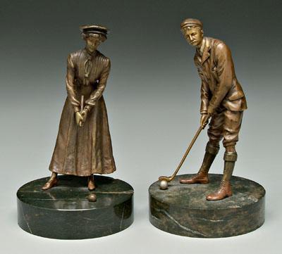 Appraisal: Two golf bronzes male and female golfers unsigned attributed to