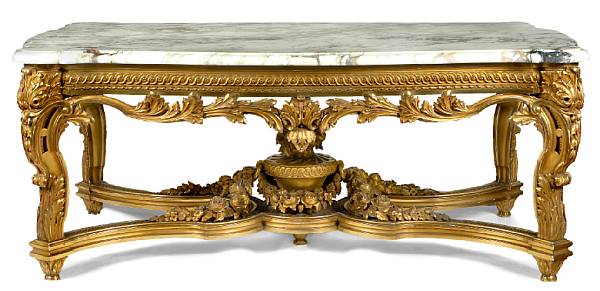 Appraisal: A Louis XV style giltwood and marble center table The