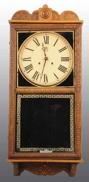 Appraisal: Wooden Clock with Gold Border Description Working Condition Excellent Size