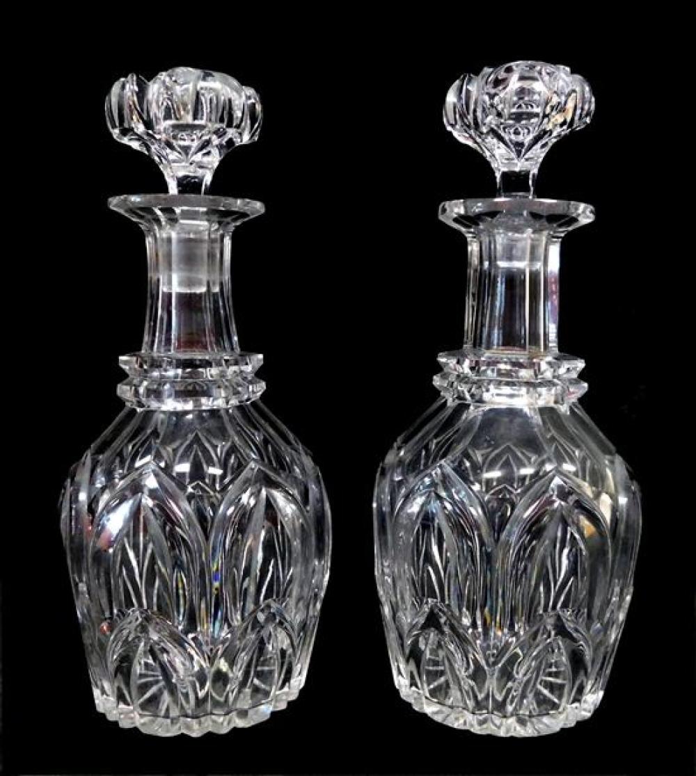 Appraisal: GLASS Pair of clear decanters unknown maker tapered neck over