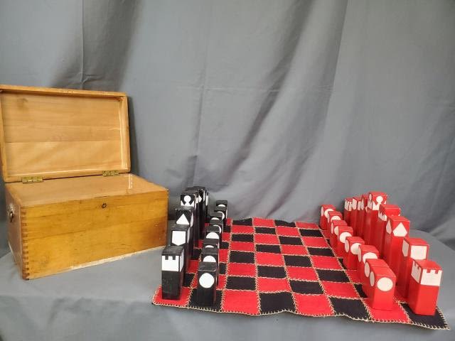 Appraisal: Unique vintage hand made chess set with chess pieces made