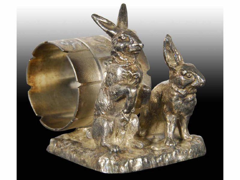 Appraisal: Rabbits On Square Base Figural Napkin Ring Description Marked Condition