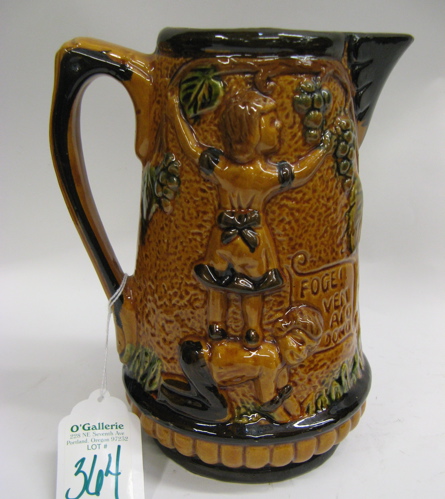 Appraisal: MAJOLICA POTTERY PITCHER in a golden brown green and dark