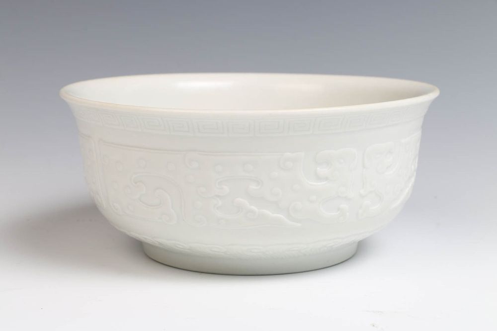 Appraisal: WHITE GLAZE BOWL QIANLONG MARK AND PERIOD of rounded form