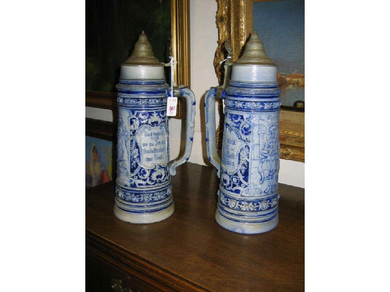 Appraisal: PAIR THREE LITER GERMAN BEER STEINS Blue and grey salt