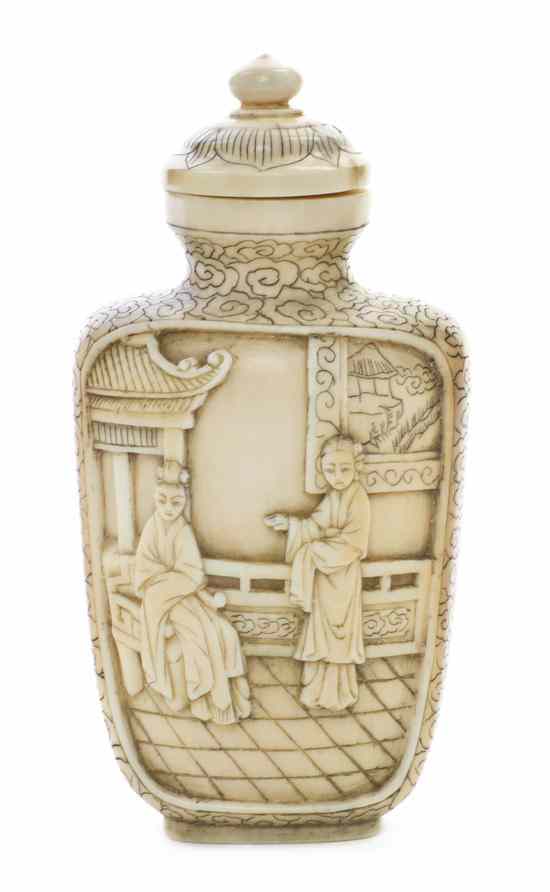 Appraisal: A Chinese Carved Ivory Snuff Bottle of compressed flask form