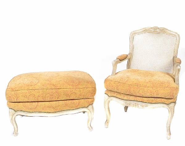 Appraisal: A Louis XV style upholstered bergere and ottoman together with