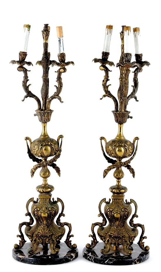 Appraisal: Pair gilt-metal and marble four-light candelabra scrolling floriform candlearms supported