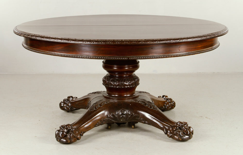 Appraisal: - Mahogany Table Table mahogany with seven leaves on tripod