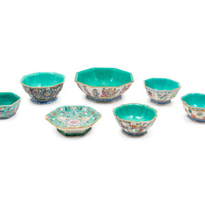 Appraisal: Seven Chinese Famille Rose Turquoise Ground Flori-Form Stem Bowl Late