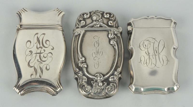 Appraisal: Lot Of Sterling Silver Match Safes Or Vestas All three