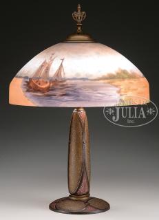 Appraisal: REVERSE PAINTED SCENIC TABLE LAMP The shade having a marine