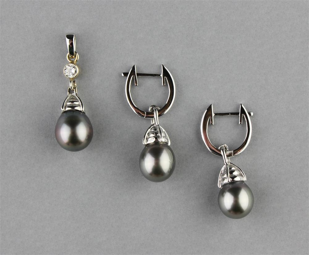 Appraisal: MIKIMOTO CULTURED SILVERY GRAY TEARDROP PEARL AND DIAMOND PENDANT AND