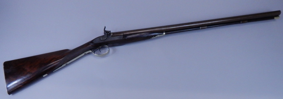 Appraisal: A cushion hammer muzzle loaded shotgun stamped A Thomson with