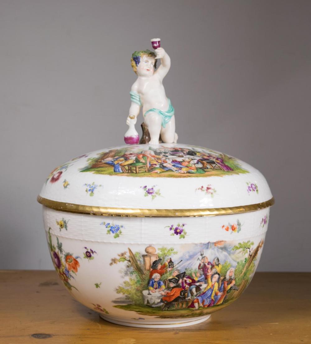 Appraisal: GERMAN KPM PORCELAIN LIDDED PUNCH BOWL featuring a putti raising