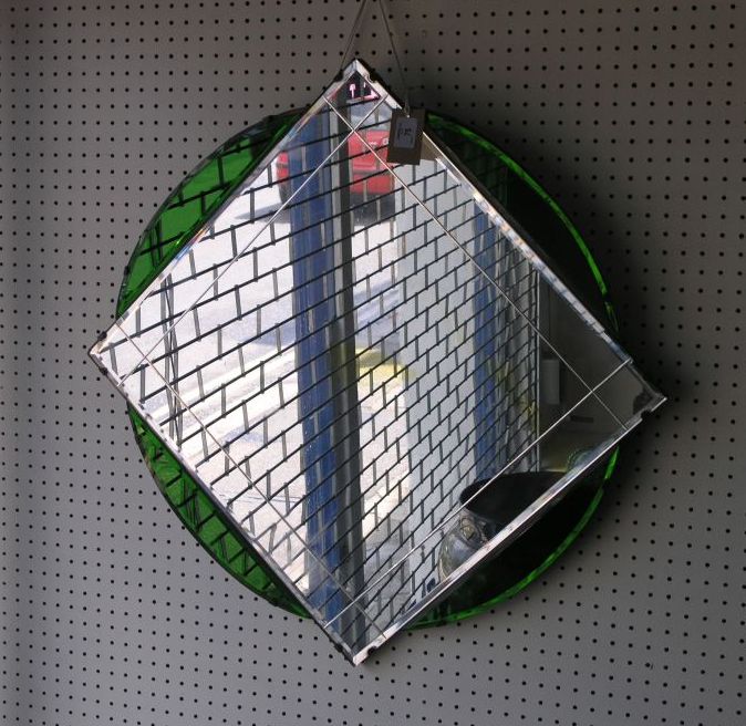 Appraisal: An Art Deco frameless mirror clear glass square section surrounded