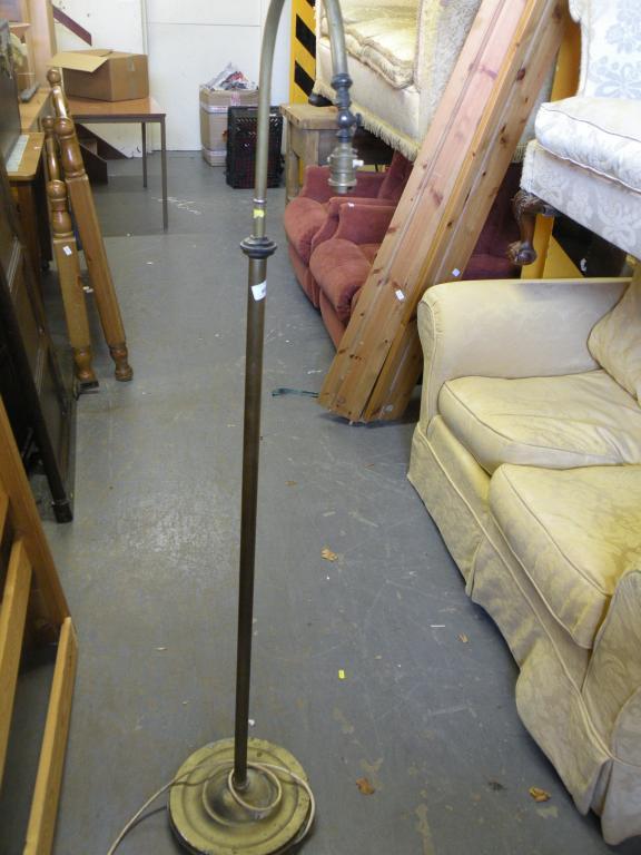 Appraisal: An adjustable brass standard lamp