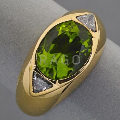 Appraisal: K YELLOW GOLD PERIDOT AND DIAMOND RING Oval peridot x