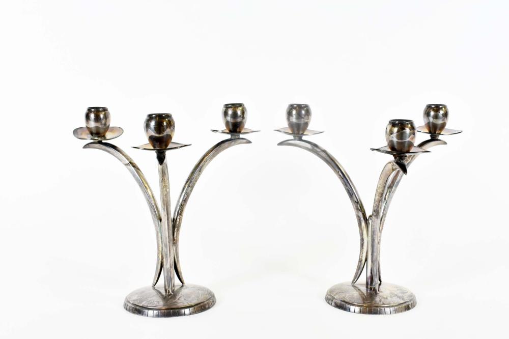 Appraisal: PAIR OF SILVER PLATE THREE-LIGHT CANDELABRAProbably Continental Unmarked Three curved