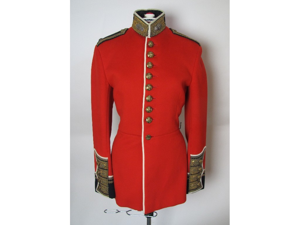 Appraisal: A Grenadier Guards red jacket and grey cape