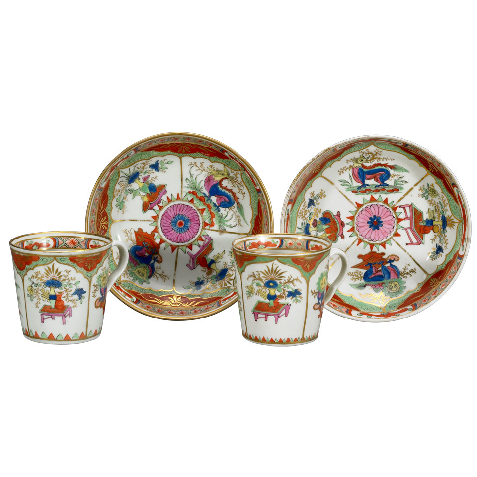 Appraisal: Pair of Chamberlains Worcester Dragon in Compartments Cups and Saucers