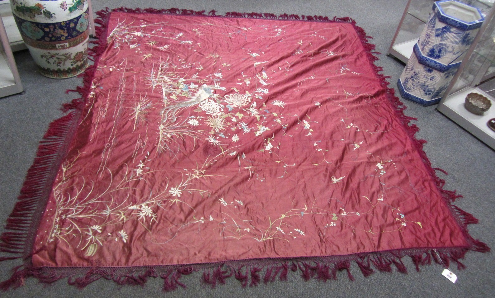 Appraisal: A Canton burgundy-ground silk coverlet in a black gilt-lacquer box