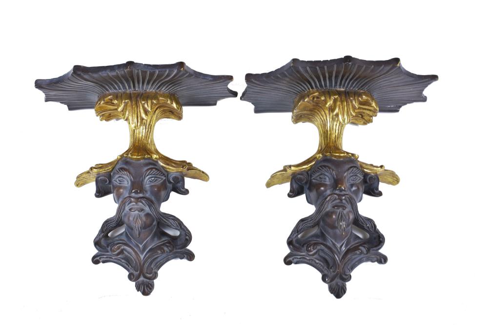 Appraisal: PAIR OF REGENCY STYLE PARCEL GILT EBONIZED COMPOSITION PLASTER BRACKETSModern