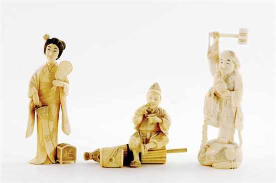 Appraisal: Japanese carved ivory okimono group Meiji period circa traditional depictions