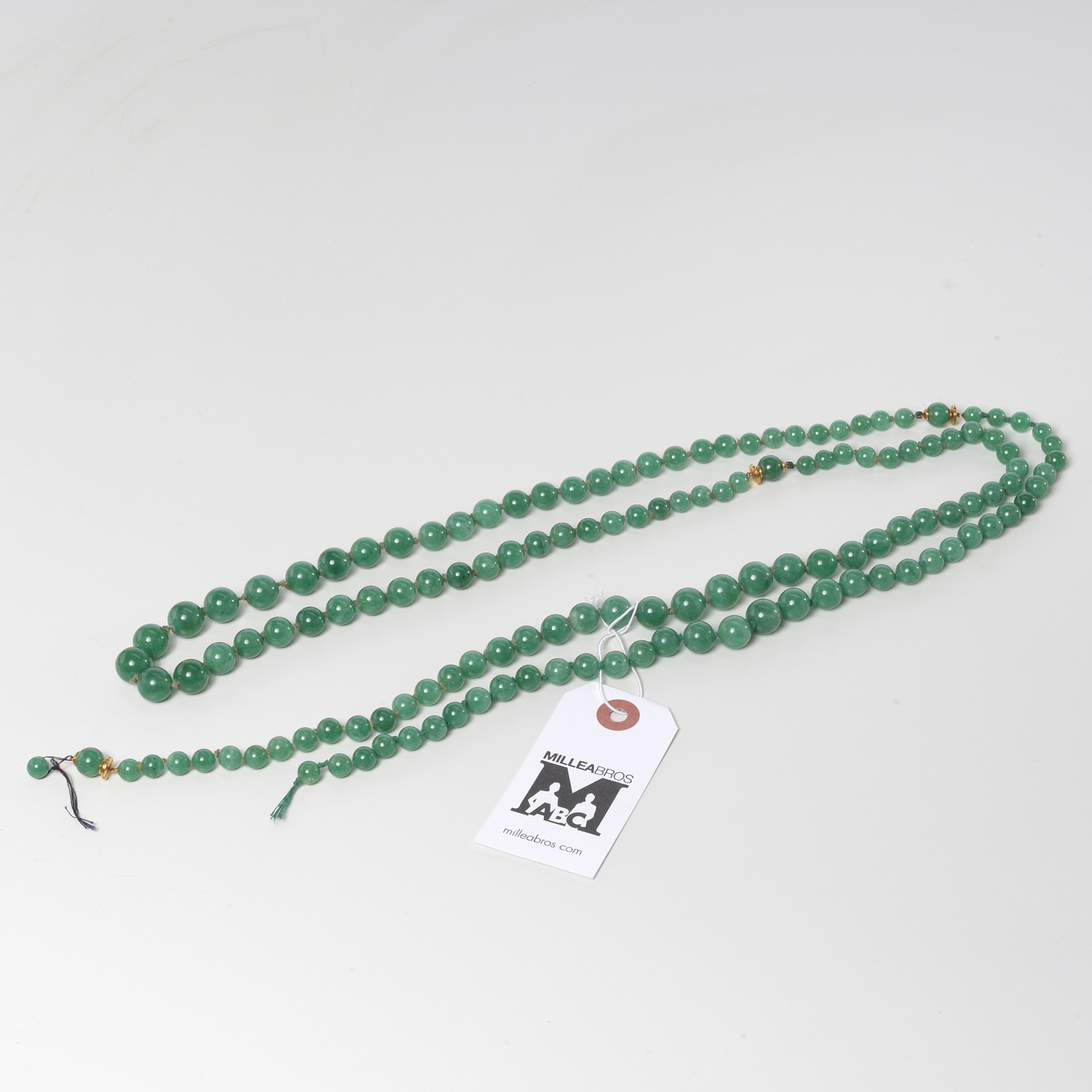 Appraisal: CHINESE GREEN JADE K BEADED NECKLACE th c jade graduated