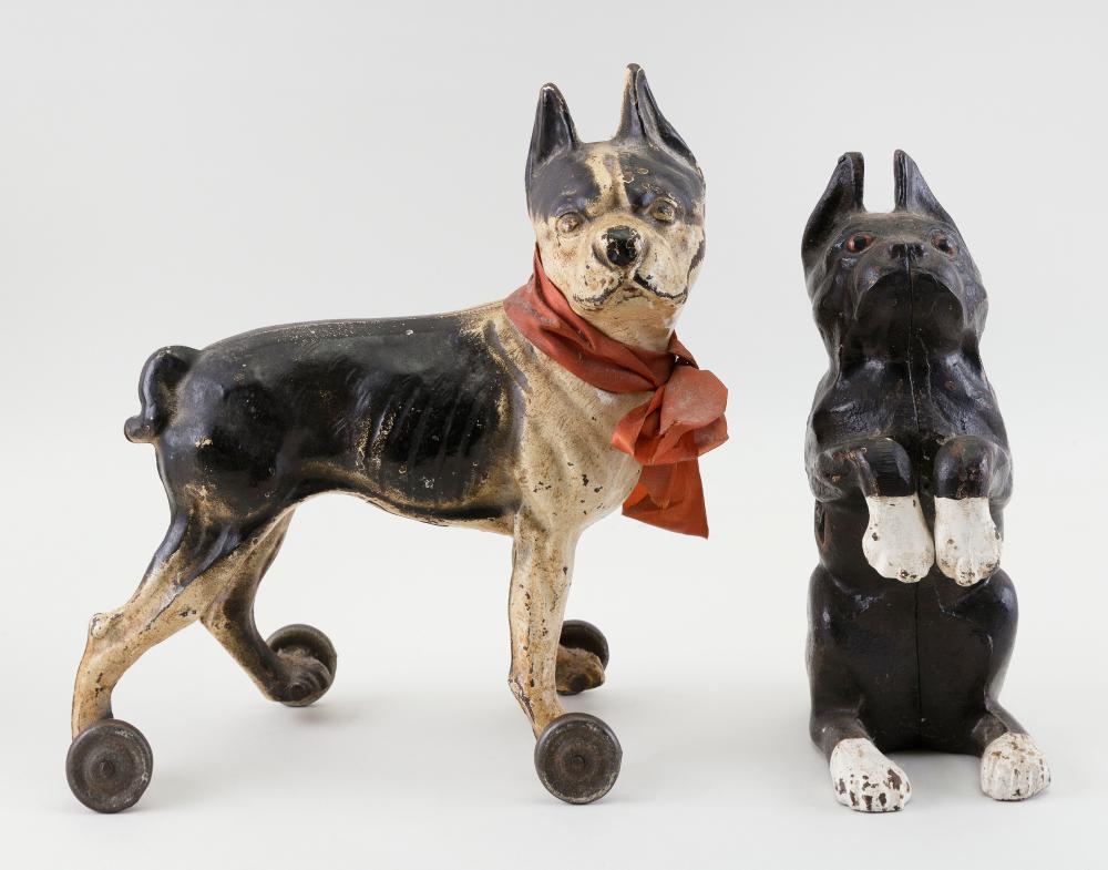 Appraisal: TWO CAST IRON DOG DOORSTOPS EARLY TH CENTURY HEIGHTS AND