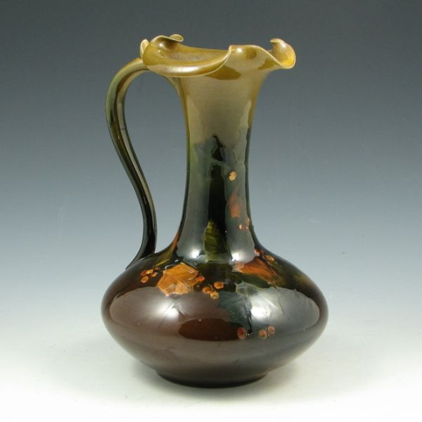 Appraisal: Rookwood Standard Glaze trefoil ewer from with holly decoration by