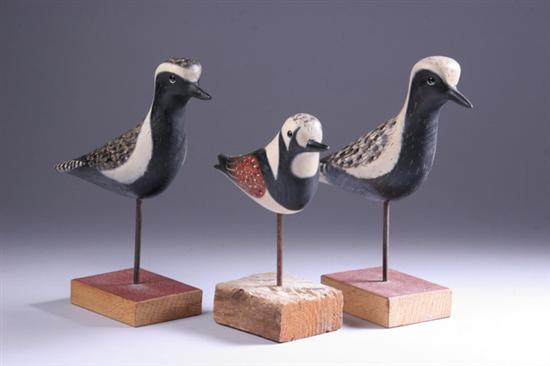 Appraisal: THREE CARVED AND PAINTED WOOD HURRICANE PETE PETERSON STICK-UP DECOYS