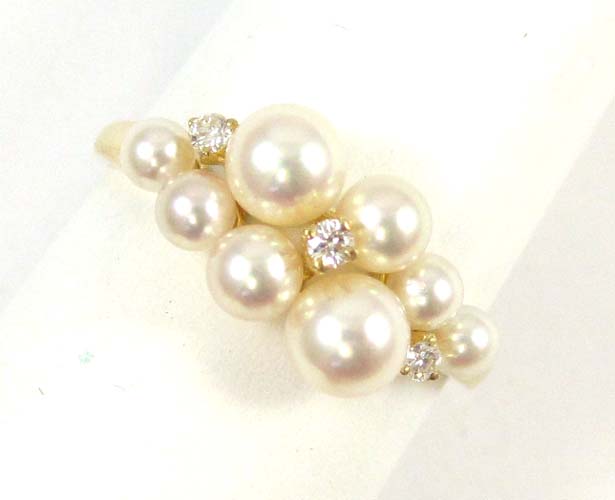 Appraisal: MIKIMOTO PEARL DIAMOND AND EIGHTEEN KARAT GOLD RING set with