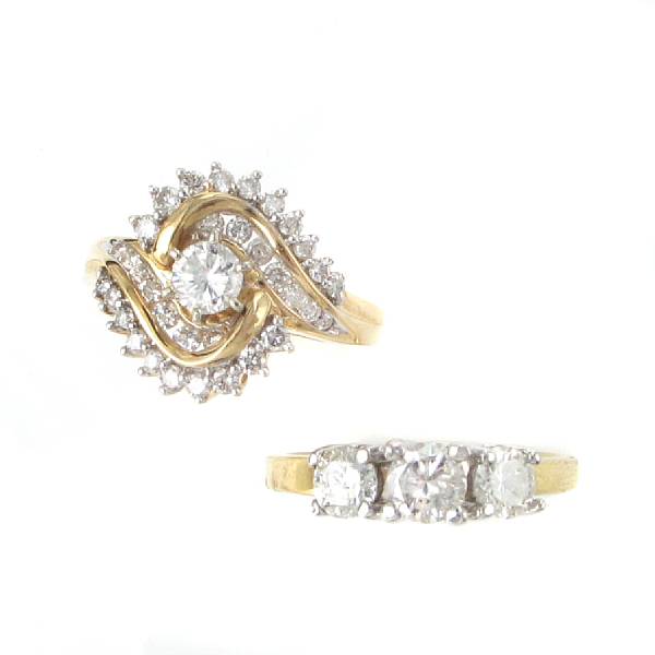 Appraisal: A collection of a three stone diamond and k gold