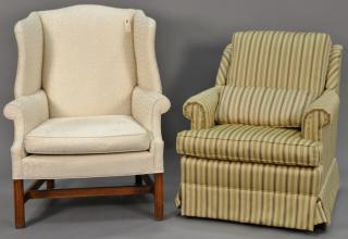 Appraisal: Two upholstered living room chairs including a white wing chair