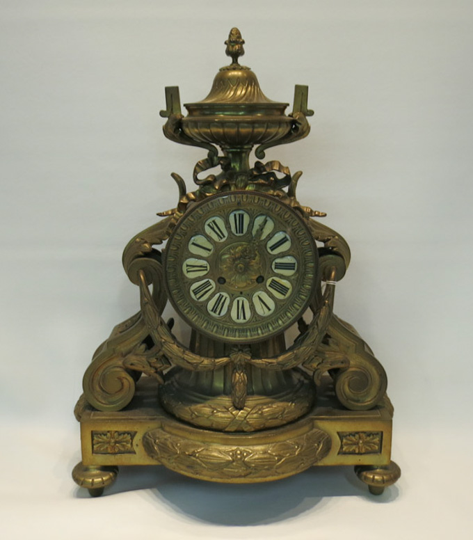 Appraisal: FRENCH BRASS MANTEL CLOCK heavy brass case with single pedestal