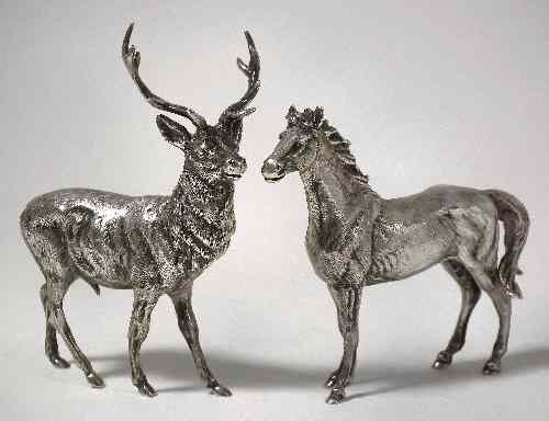 Appraisal: Two Elizabeth II cast silver figures of animals - Stag