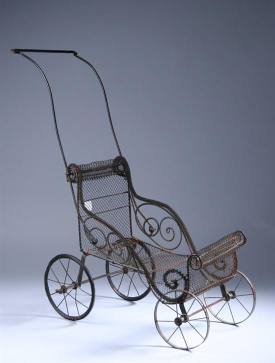 Appraisal: VICTORIAN WIRE STROLLER FOR DOLLS Metal frame covered in interlocking