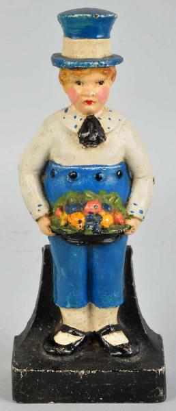 Appraisal: Cast Iron Boy Holding Fruit Basket Doorstop Boy in top