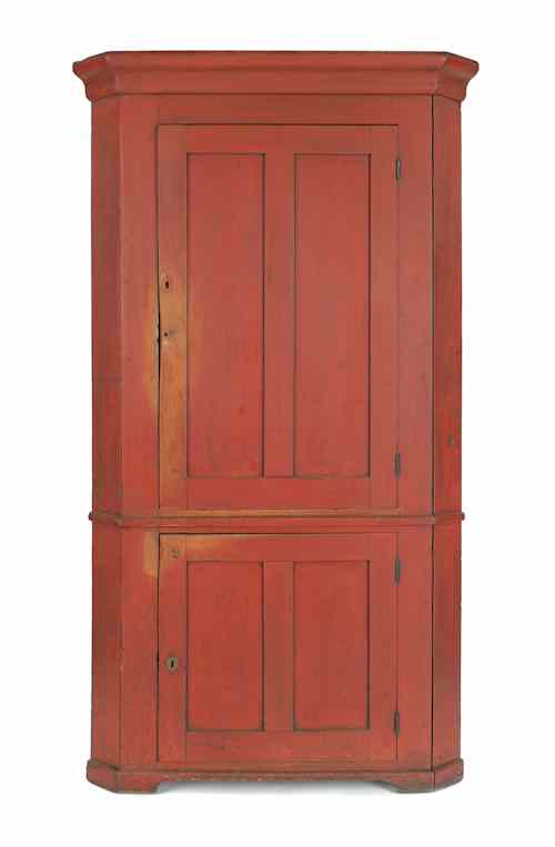 Appraisal: Pennsylvania painted pine corner cupboard ca retaining its original red