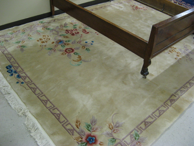 Appraisal: CONTEMPORARY CHINESE CARPET hand knotted in a colorful floral sprig