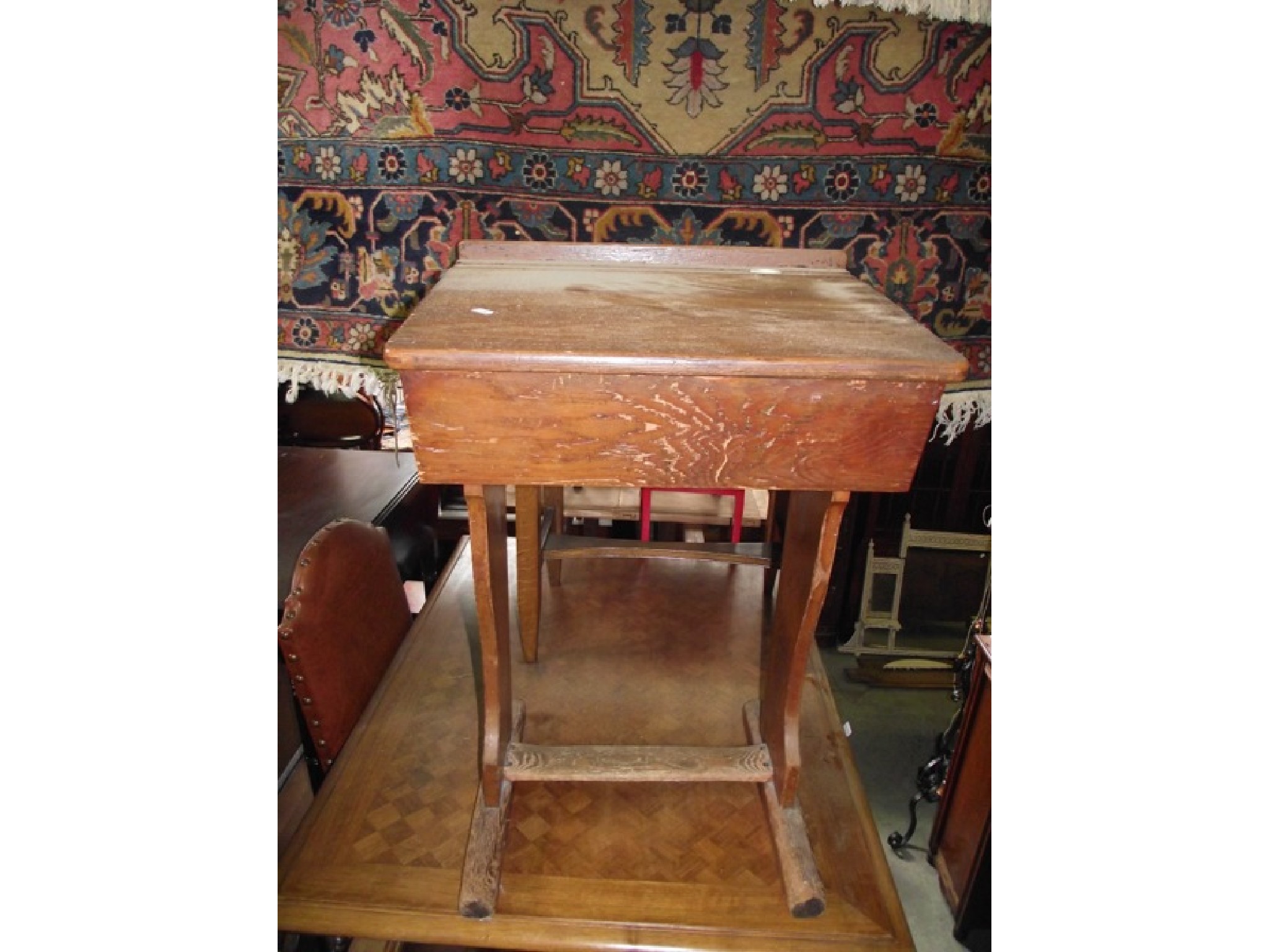 Appraisal: A vintage pitch pine child's school desk with cast iron