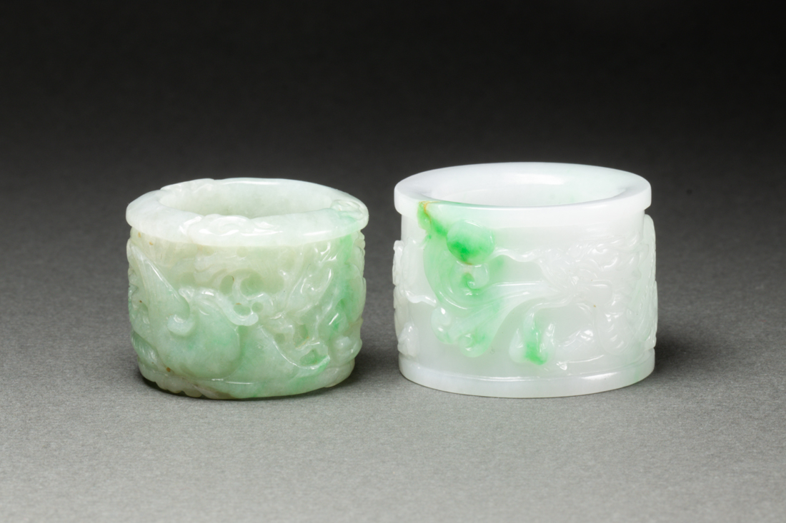 Appraisal: lot of Chinese jadeite archer's rings each carved in raised