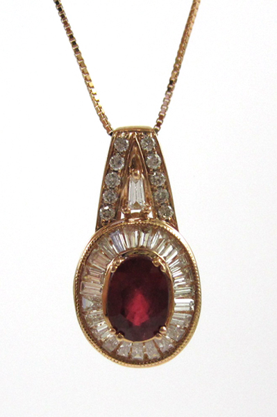 Appraisal: RUBY AND DIAMOND PENDANT NECKLACE suspended on an inch k