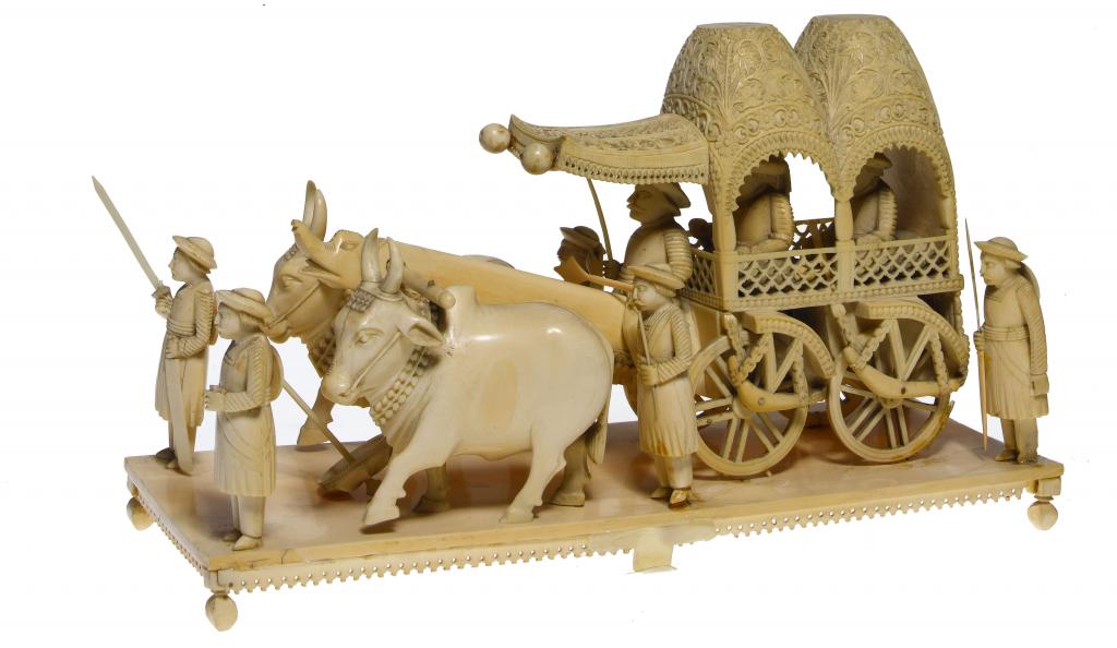 Appraisal: AN INDIAN IVORY MODEL OF A CAVALCADE with a nawab