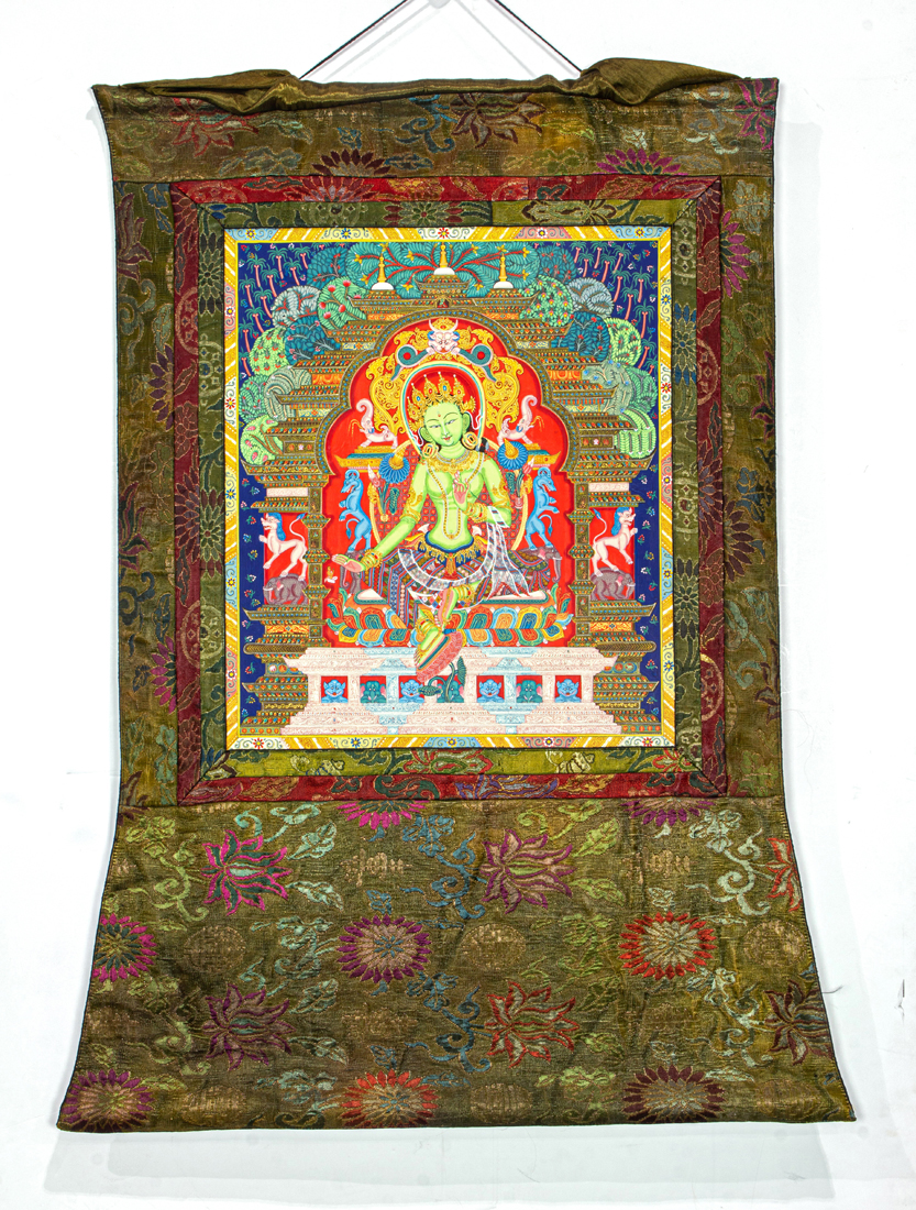 Appraisal: TIBETAN THANGKA Tibetan thangka mounted in silk brocade h x