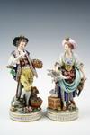 Appraisal: FIGURINES - Circa pair of German bisque figurines One depicts