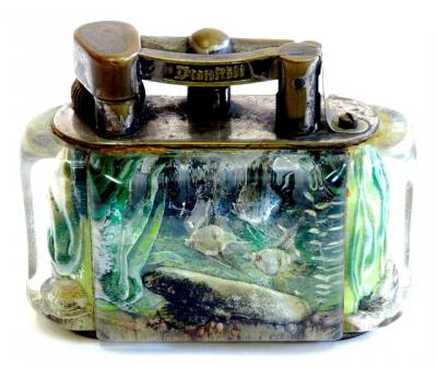 Appraisal: A DUNHILL AQUARIUM TABLE LIGHTER of shaped oblong form moulded