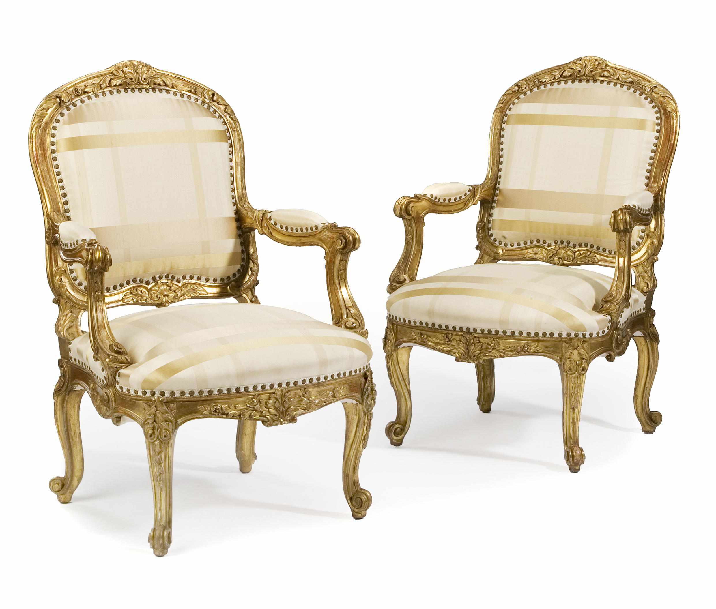 Appraisal: A pair of Louis XV style carved giltwood fauteuils late